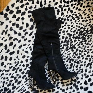 Thigh high boots with gold accent heel